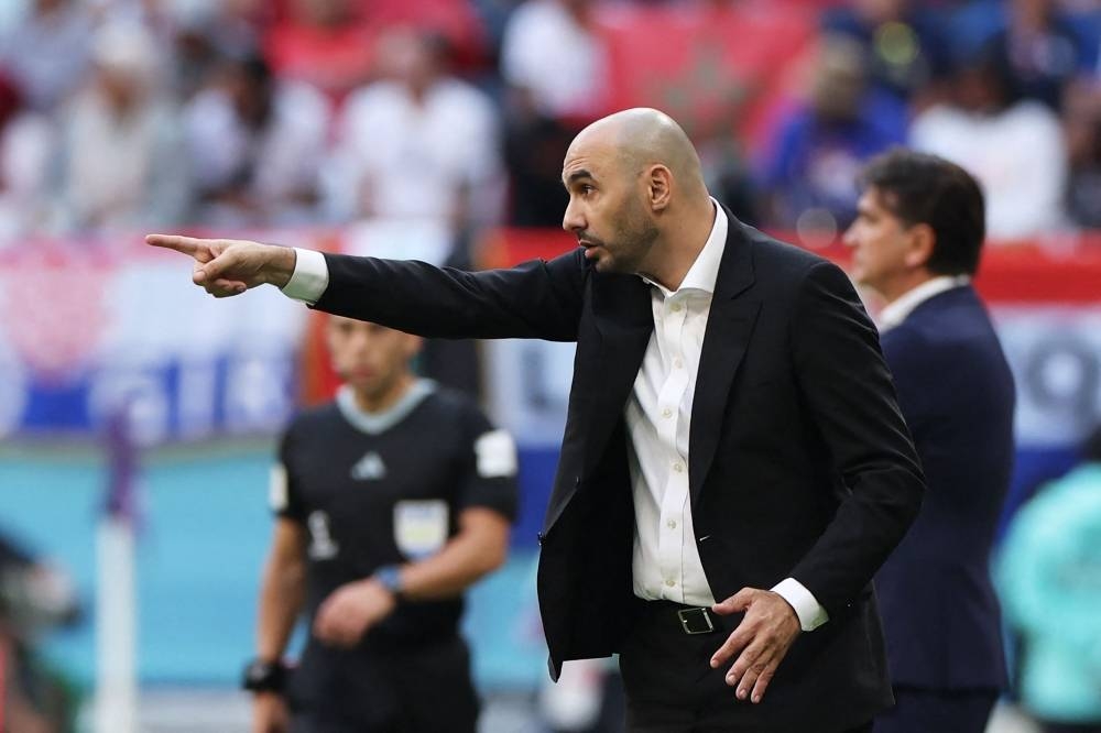 Morocco's coach Walid Regragui gestures on the touchline during the Qatar 2022 World Cup Group F football match between Morocco and Croatia at the Al-Bayt Stadium in Al Khor, north of Doha on November 23, 2022. (Photo by FADEL SENNA / AFP)