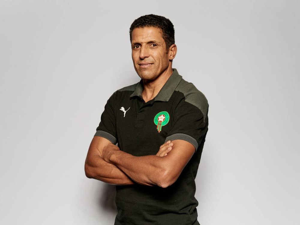 DOHA, QATAR - NOVEMBER 28: Hussein Ammouta, Head Coach of Morocco poses during the Morocco team presentation prior to the FIFA Arab Cup Qatar 2021 at St Regis Hotel on November 28, 2021 in Doha, Qatar. (Photo by Michael Regan - FIFA/FIFA via Getty Images)